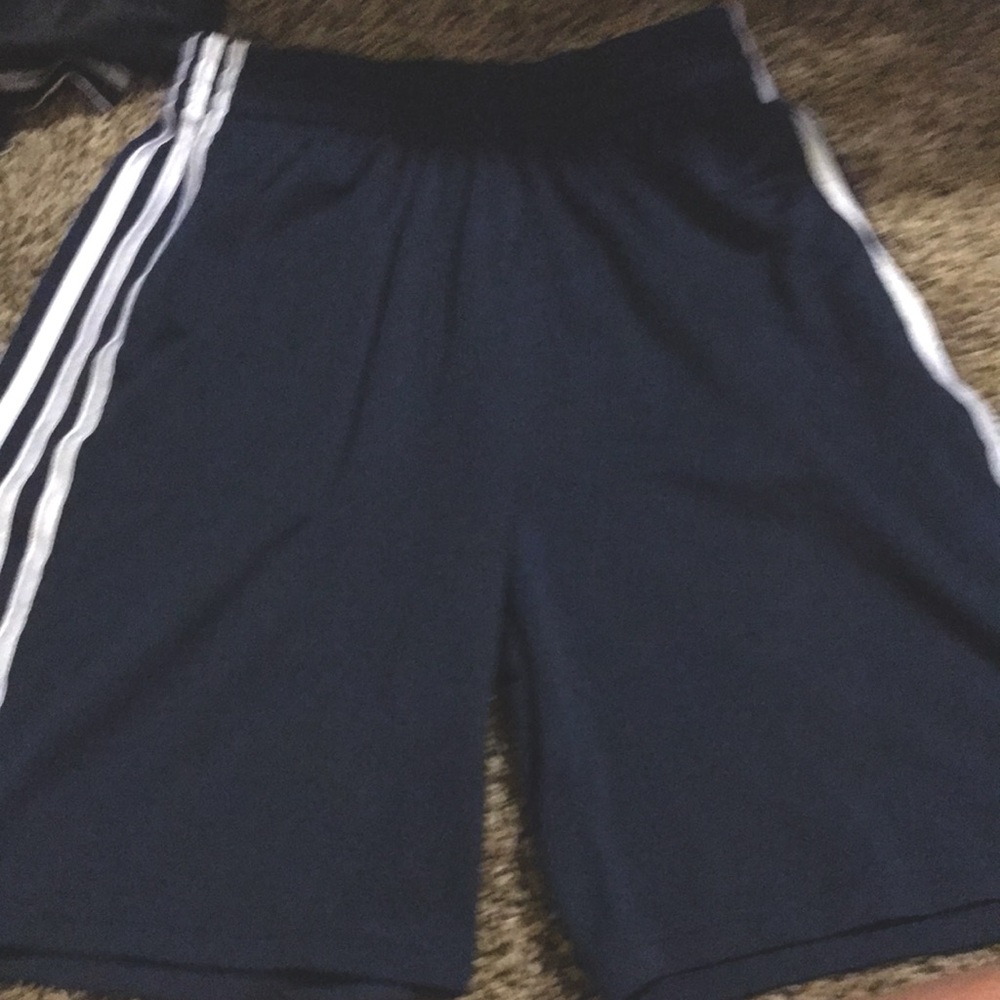 Blue Adidas shorts.